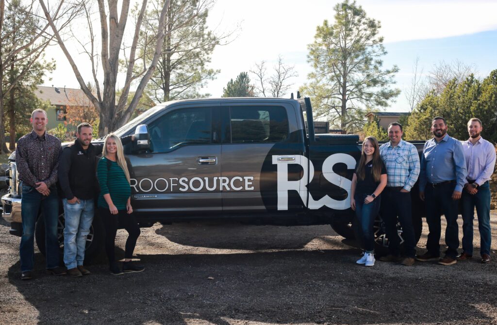 Roof Source LLC pickup truck with the team